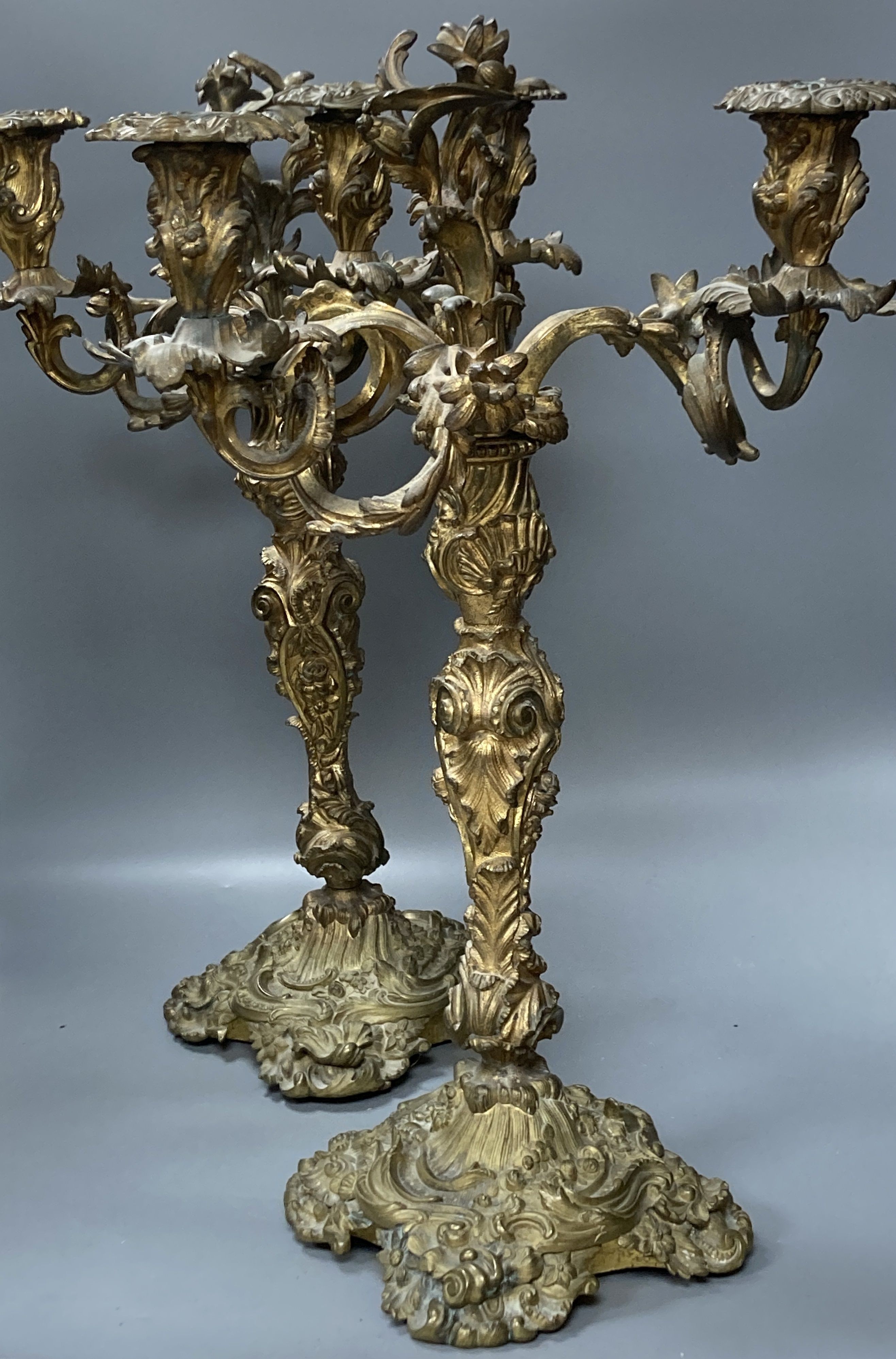 A pair of 19th century Louis XV style ormolu candelabra, 57 cm high